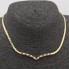 Collar de oro con rubíes y diamantes de segunda mano