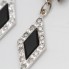 Boucles d'oreilles losange en or avec diamants et onyx d'occasion