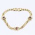 Pulsera tipo panther de oro con rubíes y circonitas