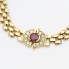Pulsera tipo panther de oro con rubíes y circonitas