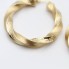 Aros rizados estilo versace de oro de segunda mano