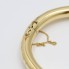 Brazalete rígido labrado de oro de segunda mano