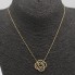Collar flor de oro con circonitas de segunda mano