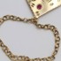 Manita corazón de oro con circonitas de segunda mano