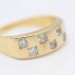 Anillo damero de oro con circonitas de segunda mano