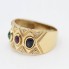 Anillo de oro con rubí, esmeralda, zafiro y circonitas
