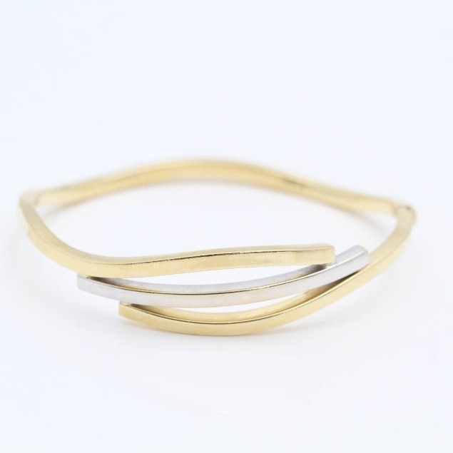 Brazalete de oro bicolor de...