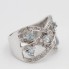 Anillo de oro con topacios y diamantes de segunda mano