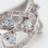 Anillo de oro con topacios y diamantes de segunda mano