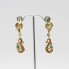 Boucles d'oreilles longues en or avec zircones d'occasion