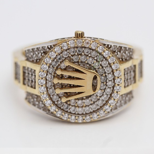 Sello tipo reloj de oro con...