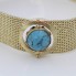 Bracelet sphère roulante en or avec zircones et turquoise
