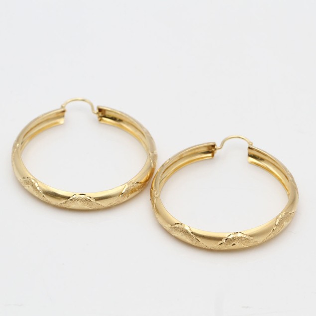 Aros labrados de oro de segunda mano