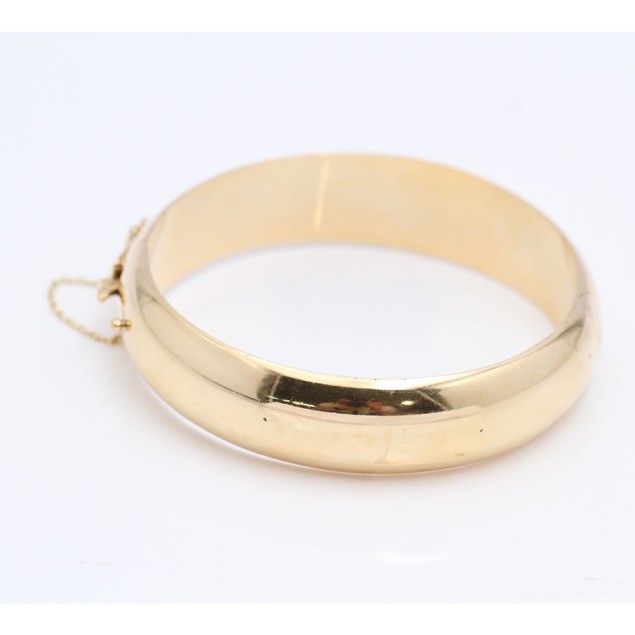 Bracelet lisse demi rond en or...