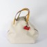 Bolso de mano Carolina Herrera Matrioshka blanco nuevo