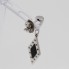 Boucles d'oreilles losange en or avec diamants et onyx d'occasion