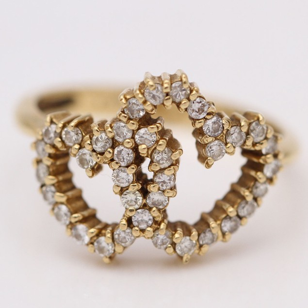 Anillo corazones de oro con diamantes...