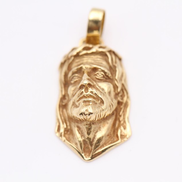 Pendentif visage du Christ en or...