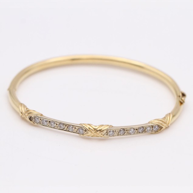 Brazalete de oro con circonitas de...