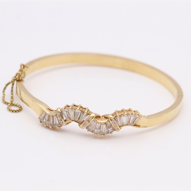 Brazalete ondulado de oro con...