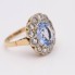 Anillo rosetón estilo vintage de oro con topacio y diamantes