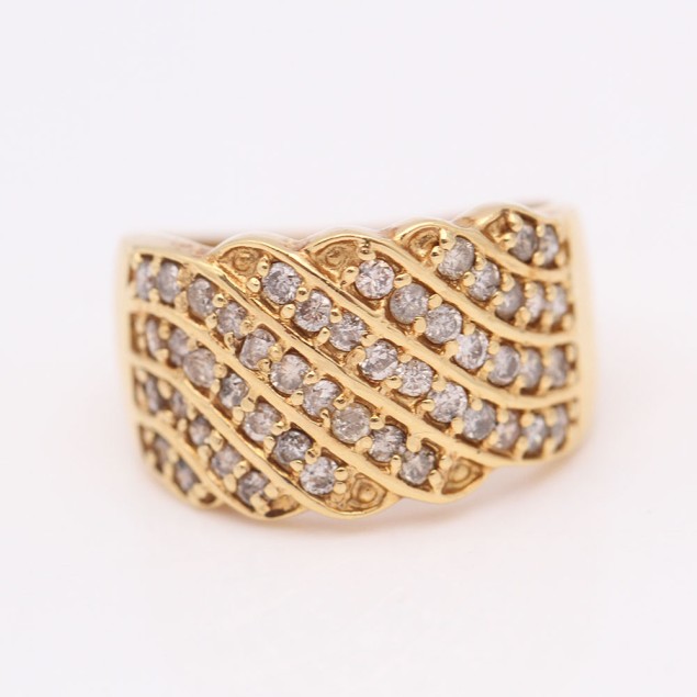 Anillo bandas onduladas de oro con...