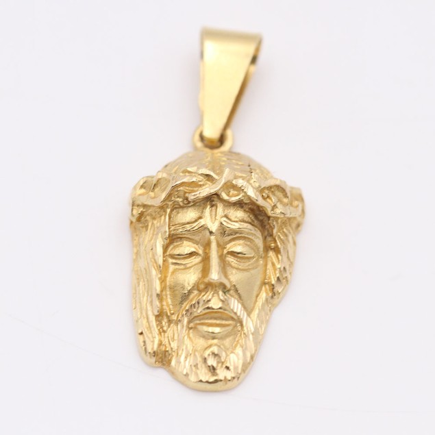 Pendentif visage du Christ en or...