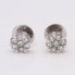 Boucles d'oreilles rosettes en or avec diamants d'occasion