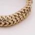 Pulsera barbada doble maciza de oro de segunda mano