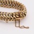 Pulsera barbada doble maciza de oro de segunda mano