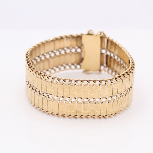 Pulsera ancha articulada labrada de...