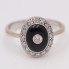 Anillo rosetón de oro con ónix y diamantes de segunda mano