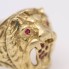 Sello león de oro con rubíes de segunda mano