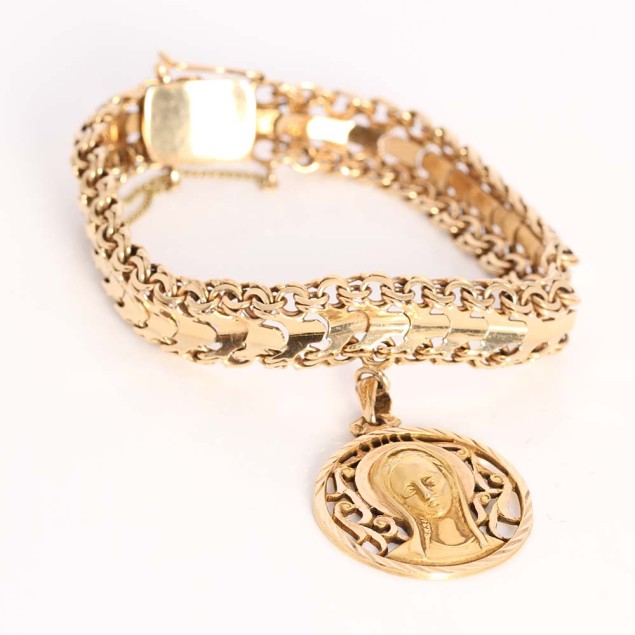 Pulsera articulada con colgante...