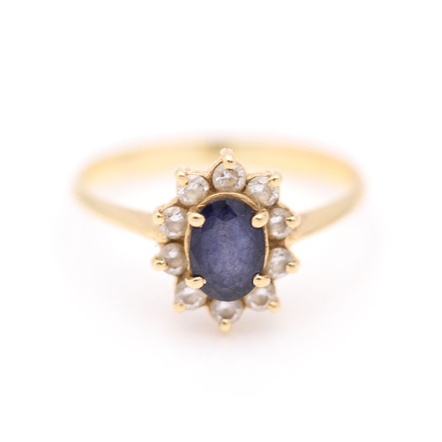 Anillo rosetón de oro con zafiro y...