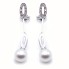 Boucles d\'oreilles longues en or blanc et perles. Tout neuf