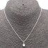Collar solitario TASAKI de platino y diamante segunda mano