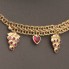 Collar para bebé racimos de uva de oro con circonitas