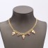 Collar para bebé racimos de uva de oro con circonitas