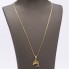 Cadena con colgante delfín de oro de segunda mano