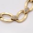 Bracelet ovale en or d'occasion avec zirconias