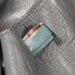Bolso de mano Carolina Herrera gris con pañuelo
