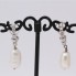 Boucles d'oreilles avec perles baroques et diamants. Seconde main