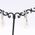 Boucles d'oreilles avec perles baroques et diamants. Seconde main