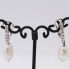 Boucles d'oreilles avec perles baroques et diamants. Seconde main