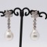 Boucles d'oreilles avec perles australiennes et diamants. Deuxième main