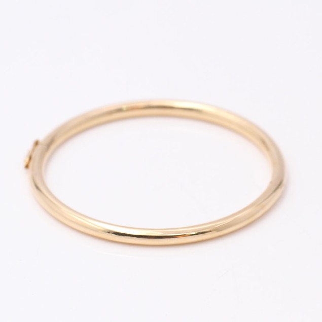 Brazalete rígido liso de oro de...