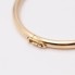 Brazalete rígido liso de oro de segunda mano