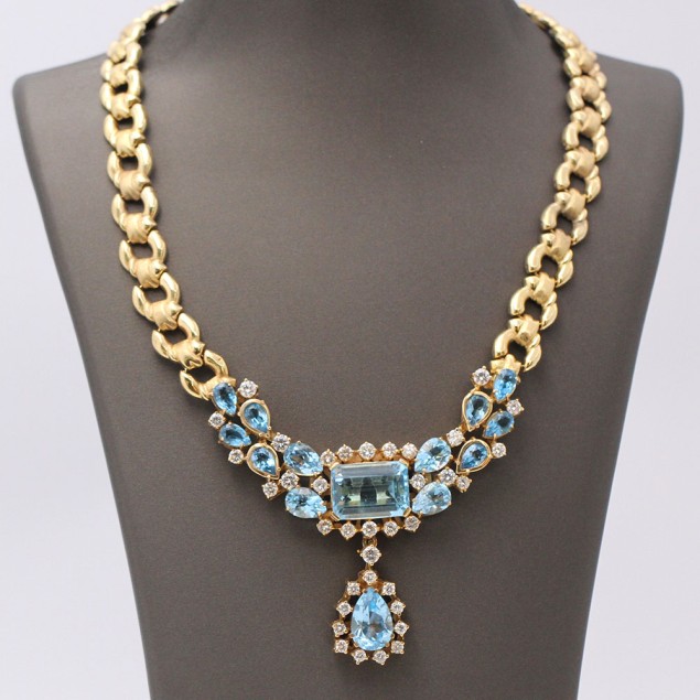 Collier en or 18k, topazes bleues et...