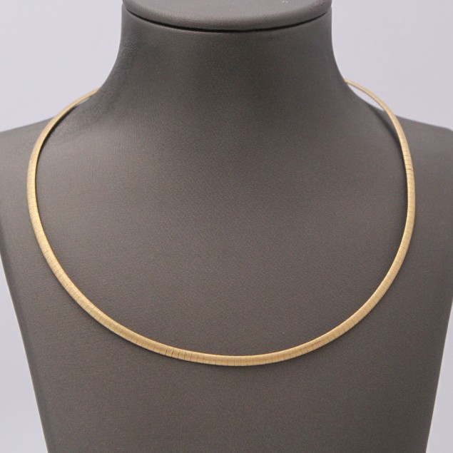 Collier rigide en or bicolore 18k...